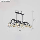 GobekUsa Sleek Black Glass Sphere Island Light for Modern Dining Rooms