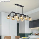 GobekUsa Sleek Black Glass Sphere Island Light for Modern Dining Rooms