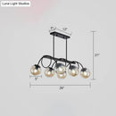 GobekUsa Sleek Black Glass Sphere Island Light for Modern Dining Rooms