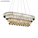 GobekUsa Sleek Chrome LED Restaurant Island Ceiling Light with Elegant Oval Crystal Shade