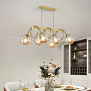 GobekUsa Sleek Gold Spiral Island Light - Post-Modern Metal Ceiling Hang Lamp with Ball Glass Shade