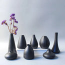 Matte black ceramic small vase elegant japanese living room decor by Decorbites
