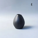 Matte black ceramic small vase elegant japanese living room decor by Decorbites