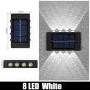 Modern black solar outdoor wall lights garden warm led beam by Decorbites