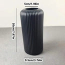 Black striped ceramic-like plastic vase living room decor by Decorbites