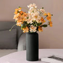 Black striped ceramic-like plastic vase living room decor by Decorbites