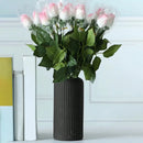 Black striped ceramic-like plastic vase living room decor by Decorbites