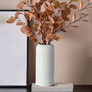 Black striped ceramic-like plastic vase living room decor by Decorbites
