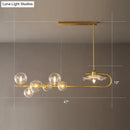 GobekUsa Stylish Brass Finish Postmodern Suspension Lamp with Glass Shade - Creative Island Light featuring Ball and Lotus Leaf Design