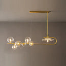 GobekUsa Stylish Brass Finish Postmodern Suspension Lamp with Glass Shade - Creative Island Light featuring Ball and Lotus Leaf Design