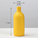 Matte yellow porcelain flower vase for living room home decor by Decorbites