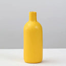 Matte yellow porcelain flower vase for living room home decor by Decorbites