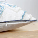 Diamond tufted blue and white cushion cover living room with tassels by Decorbites