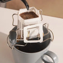 Disposable coffee filter cup with metal frame kitchen drip bag by Decorbites