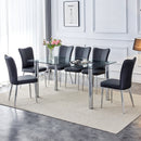 A modern minimalist style glass dining table. Transparent tempered glass tabletop with a thickness of 0.3 feet and silver metal legs. Suitable for restaurants and living rooms. 63 "x 35.4" x 30"
