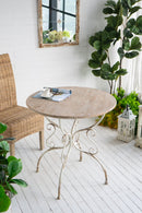 Round Wooden Table With Metal Scrollwork Legs - White Washed by Unique Piece Furniture