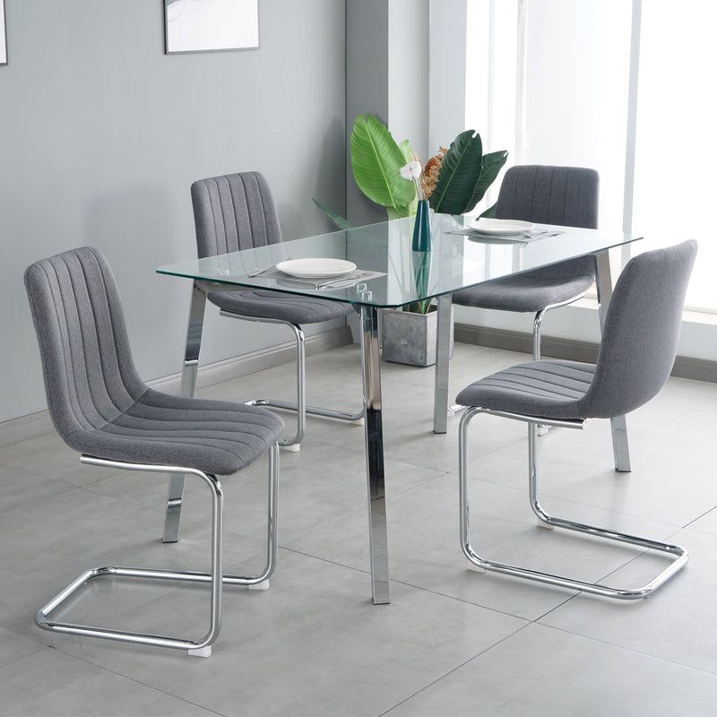 51.1" Table and chair set, one table and four chairs. Clear tempered glass table top, 0.3" thick, silver metal legs. fabric chair with electroplated metal legs.