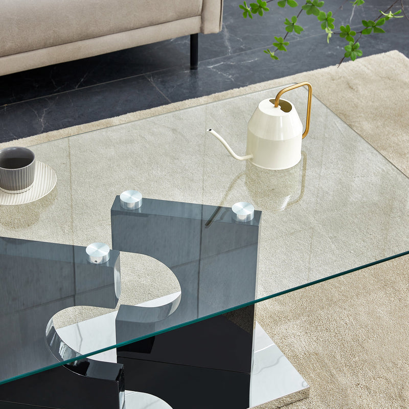 A rectangular modern and fashionable coffee table with tempered glass tabletop and black MDF legs. Suitable for living room.47.2"x25.5"x18"