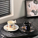 Elegant black butterfly ceramic tea cup and saucer set dining room by Decorbites