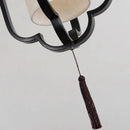 Elegant black wrought iron wall sconce lamp with tassel bedroom light by Decorbites
