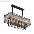 GobekUsa 14-Head Crystal Flute Hanging Ceiling Light in Swirled Black - Sleek Island Lighting Idea