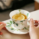 Elegant camellia porcelain cup and saucer – dining room floral tea set by Decorbites