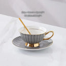 Elegant gold porcelain tea set dining room rack with bird figurine by Decorbites