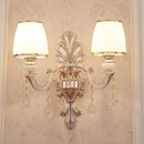 GobekUsa Gold Scrolled Arm Wall Mount Lamp with Crystal Accent - Elegant Metallic Wall Sconce