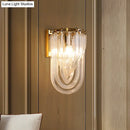 GobekUsa Gold Oval Wall Lamp with Twisted Crystal Shade