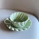 Elegant lace ceramic coffee cup and saucer set white & mint dining room by Decorbites