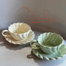 Elegant lace ceramic coffee cup and saucer set white & mint dining room by Decorbites