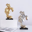 Elegant silver & gold 26cm resin kissing couple – living room decor by Decorbites