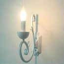 Elegant white iron wall lamp bedroom scrollwork sconce by Decorbites
