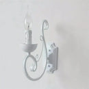 Elegant white iron wall lamp bedroom scrollwork sconce by Decorbites