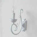 Elegant white iron wall lamp bedroom scrollwork sconce by Decorbites