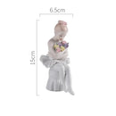 Elegant white porcelain ballet girl figurine set bedroom decor by Decorbites