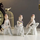 Elegant white porcelain ballet girl figurine set bedroom decor by Decorbites