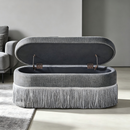 Oval Upholstered Storage Ottoman with Fringe Trim