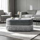 Oval Upholstered Storage Ottoman with Fringe Trim