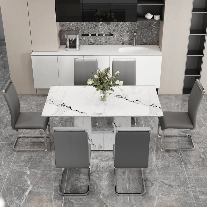 A simple dining table. A dining table with a white marble pattern. 6 PU synthetic leather high backrest cushioned side chairs with C-shaped silver metal legs. DT-SQ-16090-wh