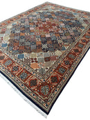 Hand-Knotted Indo-Joshegan Wool Rug – 12'2" x 9'1" – Geometric Medallion Design, Rich Warm Palette