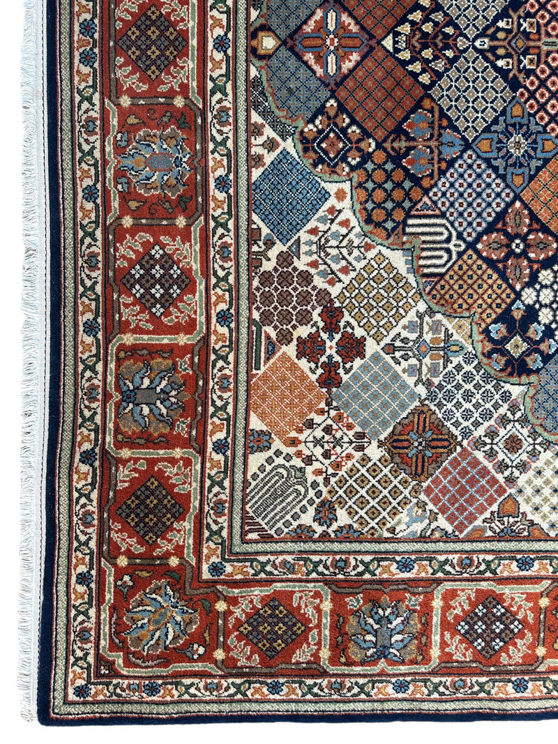 Hand-Knotted Indo-Joshegan Wool Rug – 12'2" x 9'1" – Geometric Medallion Design, Rich Warm Palette