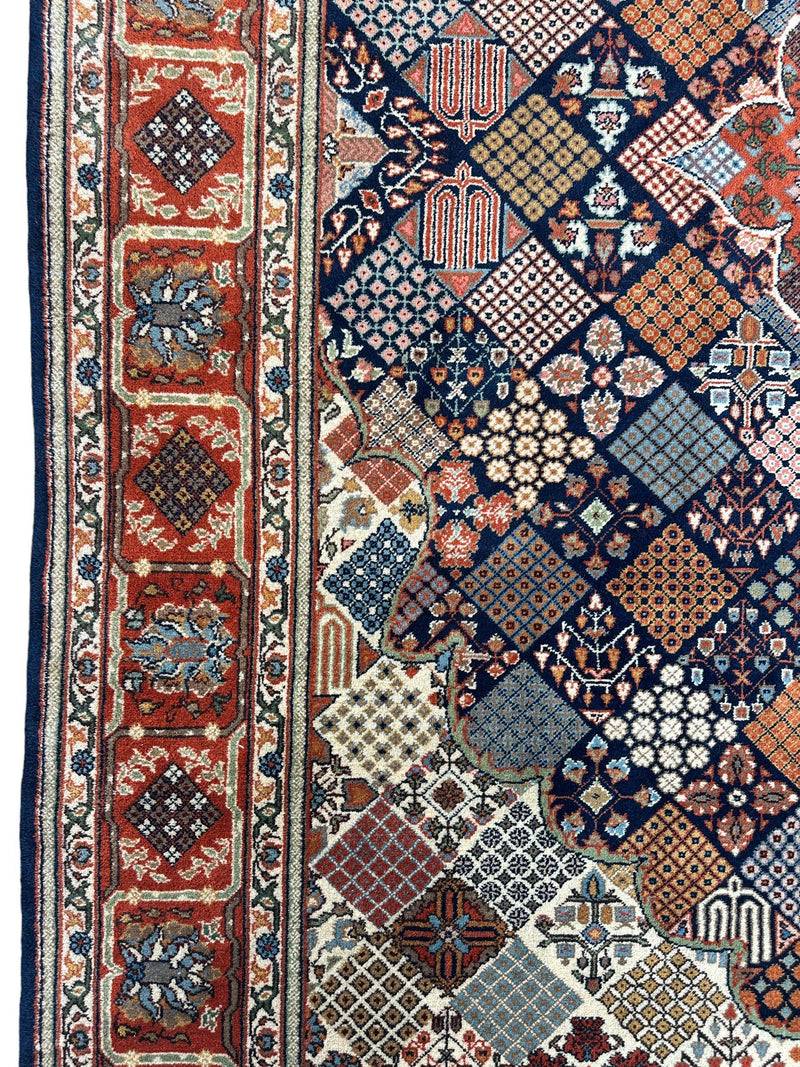 Hand-Knotted Indo-Joshegan Wool Rug – 12'2" x 9'1" – Geometric Medallion Design, Rich Warm Palette