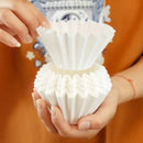 Fluted white disposable paper coffee filters kitchen basket style by Decorbites
