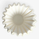 Fluted white disposable paper coffee filters kitchen basket style by Decorbites