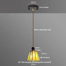Geometric brass and clear glass led pendant light dining room by Decorbites