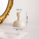 Geometric ceramic candle holder set – living room cream decor by Decorbites