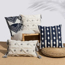 Geometric embroidered cushion cover with tufted tassels bedroom decor by Decorbites