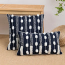 Geometric embroidered cushion cover with tufted tassels bedroom decor by Decorbites