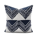 Geometric embroidered cushion cover with tufted tassels bedroom decor by Decorbites